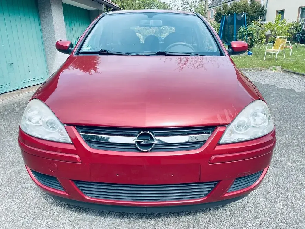 Używany Opel Corsa 80 KM (58 kW) 2006 Pomarańczowy Hatchback