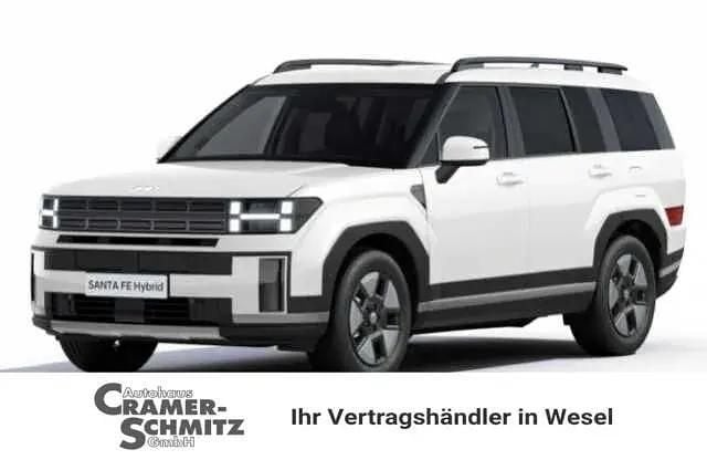 Creamy white Neu 2025 Hyundai Santa Fe Intro Edition SUV | 55.990 € - Bild 1/4