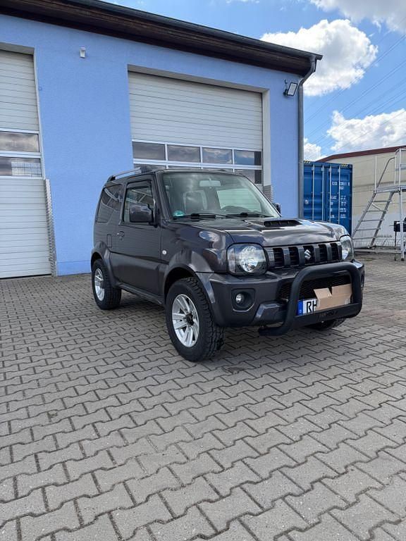Second-hand Suzuki Jimny Style 86 CP (63 kW) 2012 Gri SUV