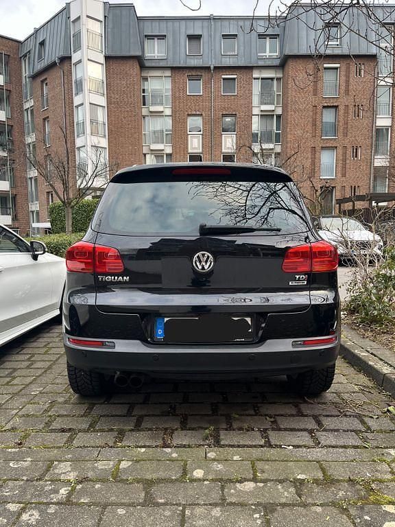 Gebraucht VW Tiguan Cup 110 PS (80 kW) 2014 Schwarz SUV