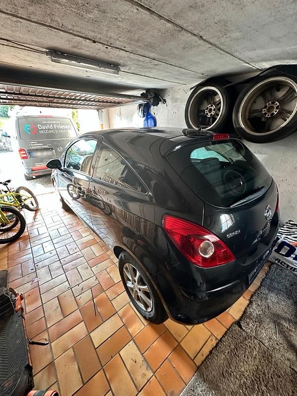 Gebraucht Opel Corsa 69 PS (50 kW) 2013 Schwarz Kleinwagen