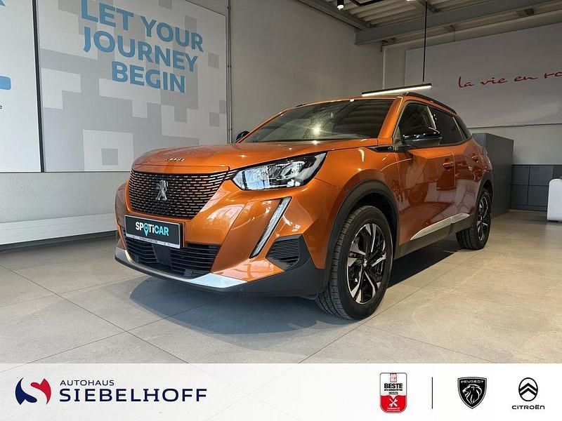 Gebraucht Peugeot e-2008 Allure 100 kW (136 PS) 2022 Orange fusion SUV