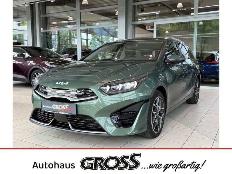 Dunkelgruen Gebraucht 2022 Kia Ceed Sportswagon Platinum Edition Kombi | 22.695 € (Etwas zu teuer) - Bild 1/4