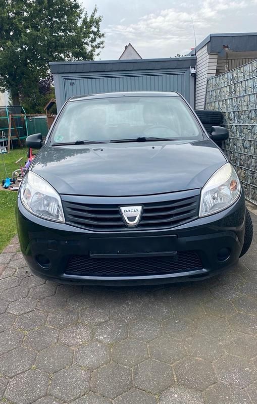 Grau Gebraucht 2009 Dacia Sandero Kleinwagen | 900 € - Bild 1/4