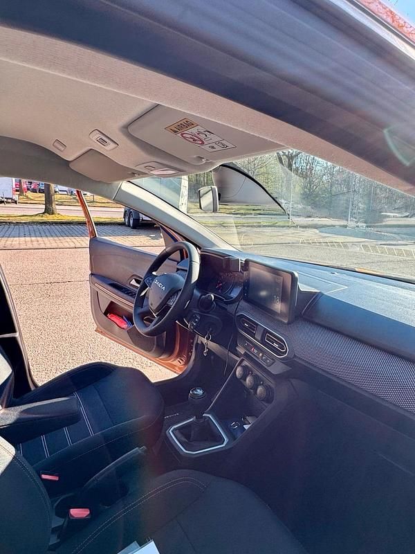 Gebraucht Dacia Sandero Expression 91 PS (66 kW) 2023 Orange Limousine