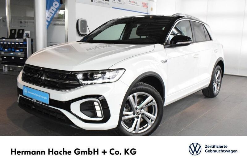 Pure white schwarz (weiß) Gebraucht 2024 VW T-Roc R-line SUV | 31.749 € (Fairer Preis) - Bild 1/4