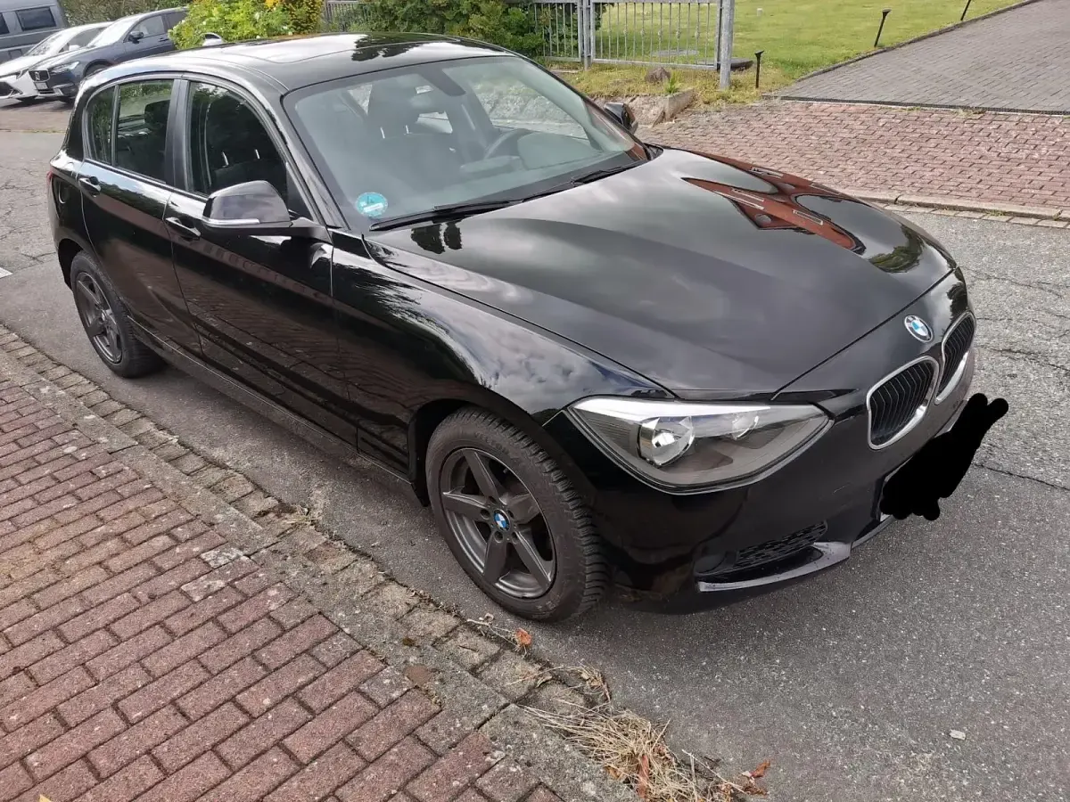 Gebraucht BMW 116 116 PS (85 kW) 2012 Schwarz Kleinwagen