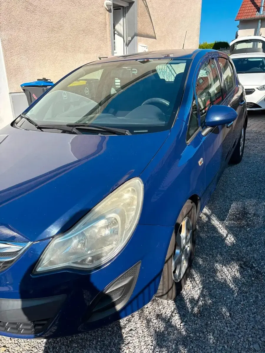 Gebraucht Opel Corsa 87 PS (63 kW) 2011 Blau Kleinwagen