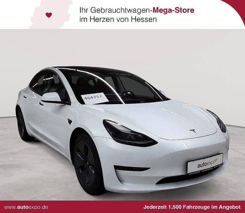 Pearl white multicoat Gebraucht 2021 Tesla Model 3 Standard Range Plus Limousine | 25.990 € (Guter Preis) - Bild 1/4