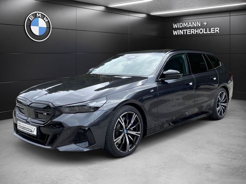 Grau Gebraucht 2024 BMW i5 Comfort Edition Limousine | 78.380 € (Fairer Preis) - Bild 1/3