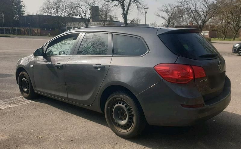 Gebraucht Opel Astra 125 PS (91 kW) 2011 Grau Kombi