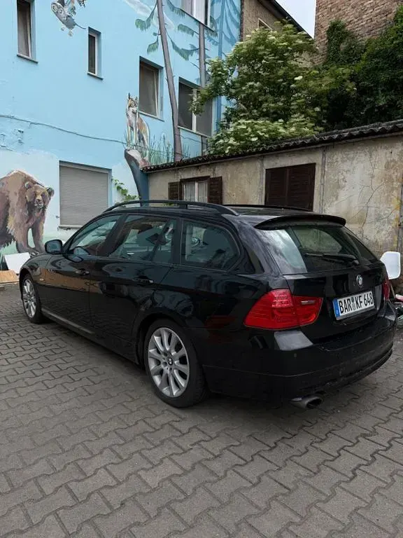 Gebraucht BMW 318 143 PS (105 kW) 2009 Schwarz Kombi