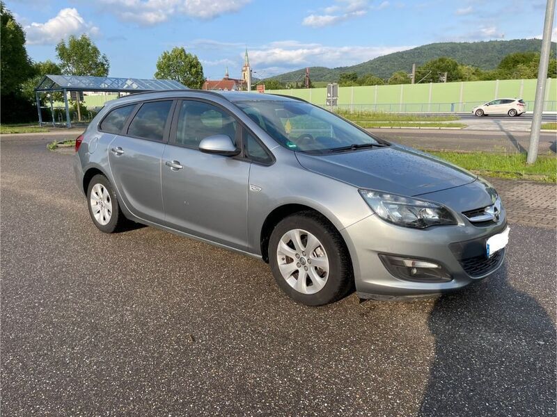Andere außenfarben Gebraucht 2014 Opel Astra Sport Kombi | 7.500 € (Fairer Preis) - Bild 1/4
