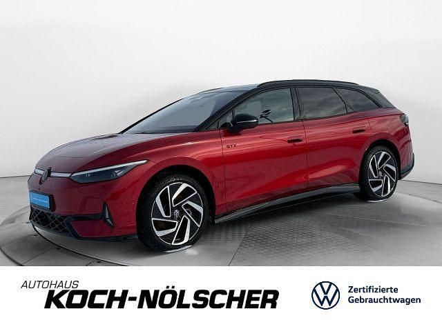 Kings red metallic Gebraucht 2024 VW ID.7 GTX Kombi | 52.930 € (Fairer Preis) - Bild 1/4