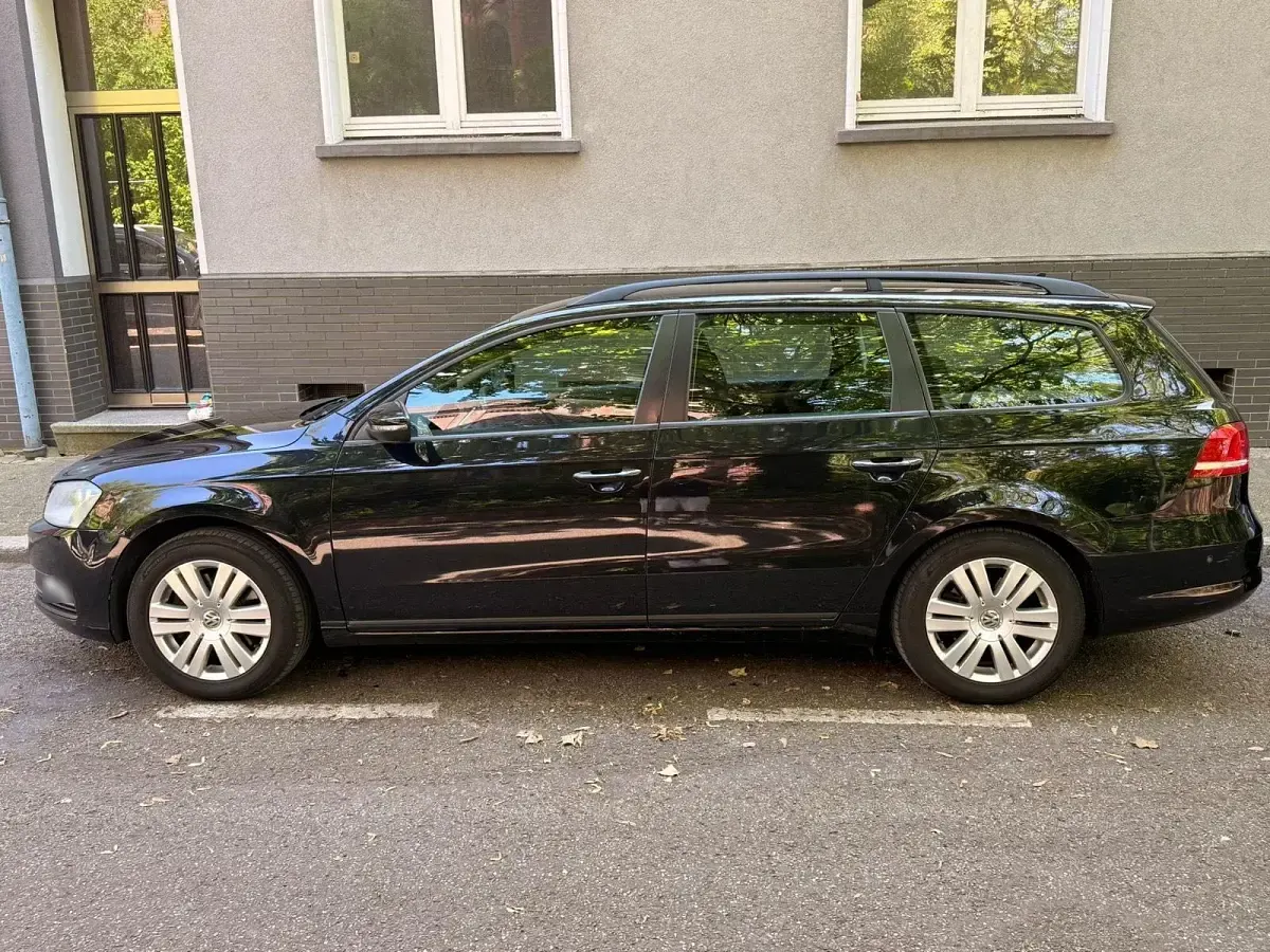 Używany VW Passat 140 KM (102 kW) 2014 Czarny Kombi