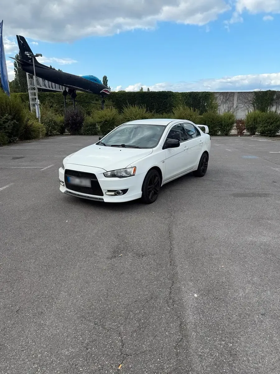 Gebraucht Mitsubishi Lancer 150 PS (110 kW) 2011 Weiß Limousine