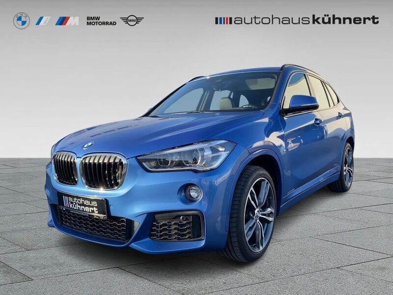 Estorilblau 2 metallic Gebraucht 2018 BMW X1 M Sport SUV | 23.335 € (Fairer Preis) - Bild 1/4