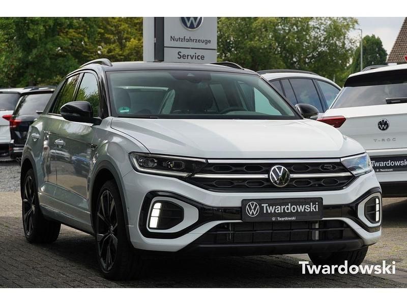 Pure white Gebraucht 2024 VW T-Roc R-line SUV | 32.490 € (Fairer Preis) - Bild 1/4