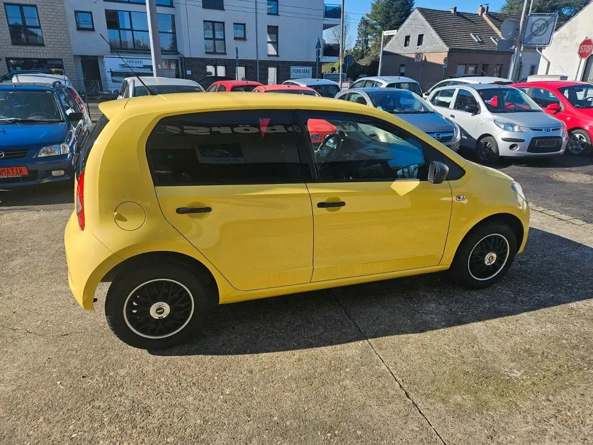 Używany Seat Mii Reference 60 KM (44 kW) 2012 Żółty Hatchback