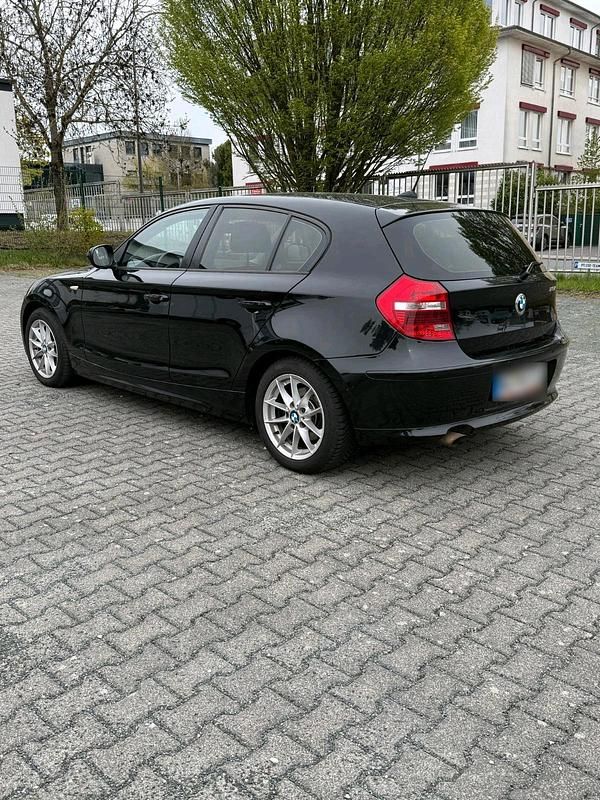 Second-hand BMW 116 116 CP (85 kW) 2011 Negru Hatchback