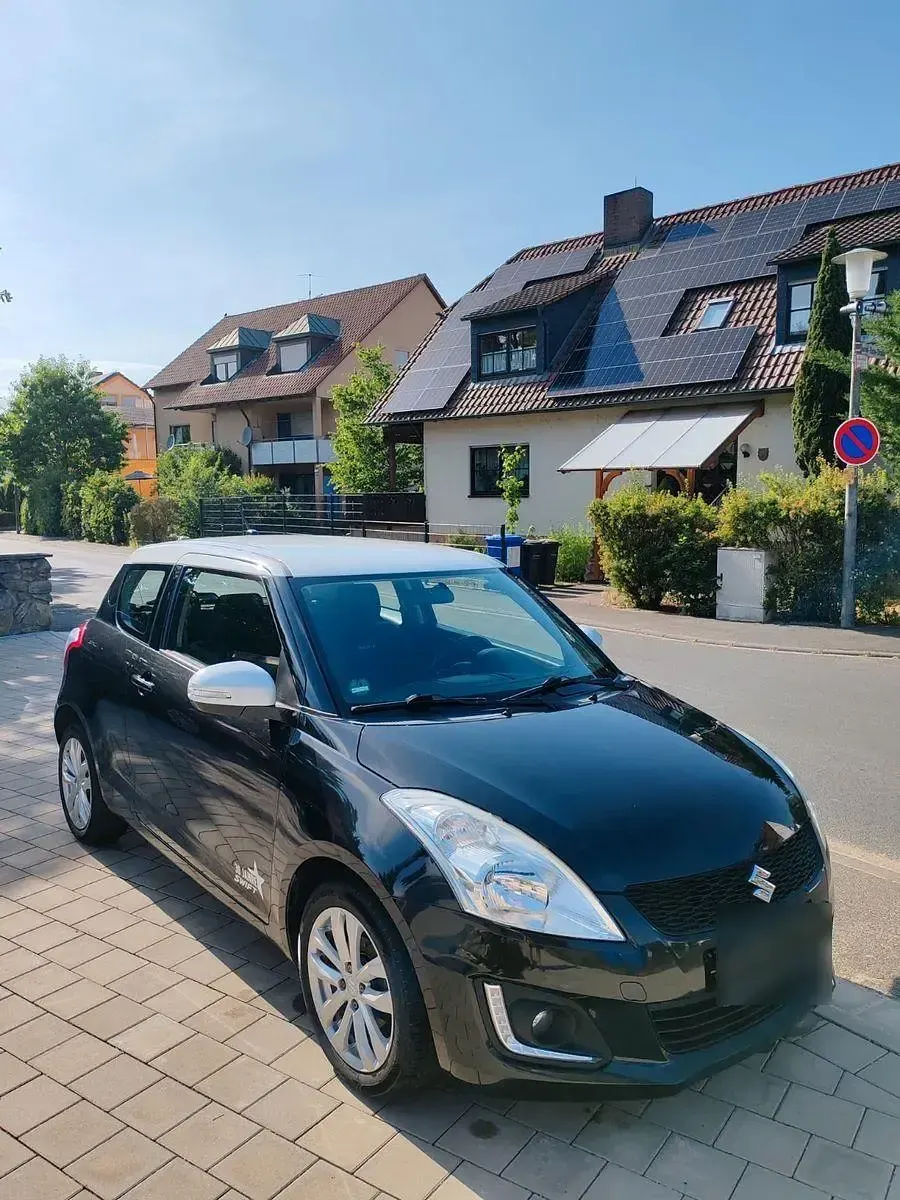 Gebraucht Suzuki Swift 94 PS (69 kW) 2014 Schwarz Kleinwagen