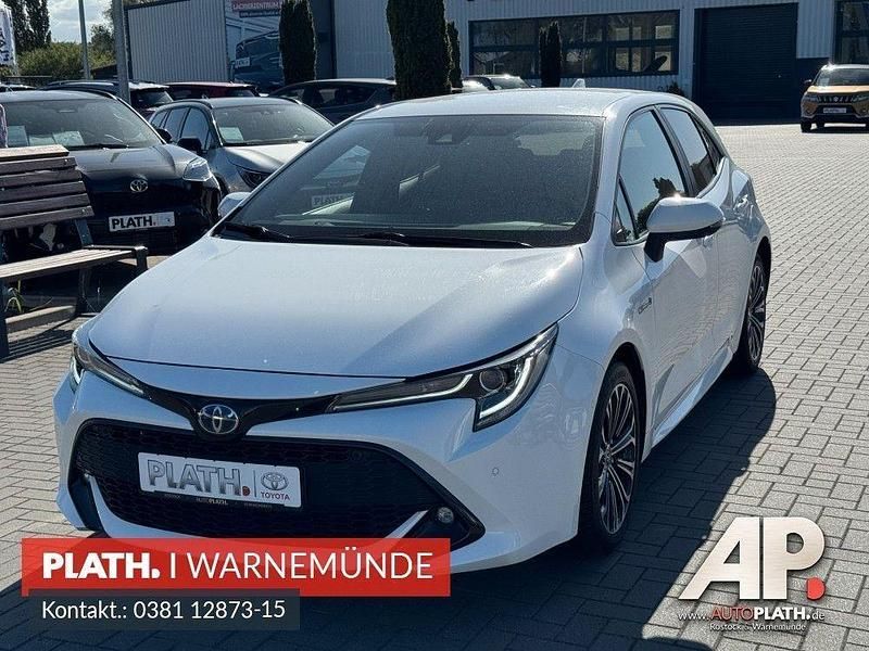 Weiß Gebraucht 2019 Toyota Corolla Hybrid Limousine | 20.690 € (Fairer Preis) - Bild 1/4