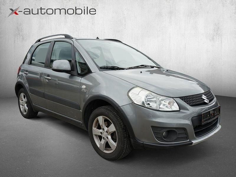 Grau Gebraucht 2010 Suzuki SX4 Comfort SUV | 5.900 € (Fairer Preis) - Bild 1/4