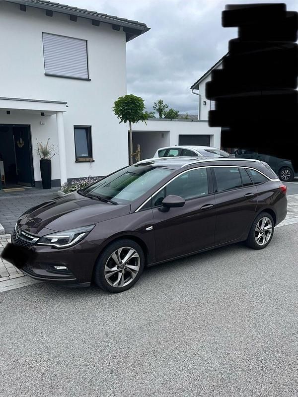 Braun Gebraucht 2016 Opel Astra Dynamic Kombi | 10.700 € (Fairer Preis) - Bild 1/4