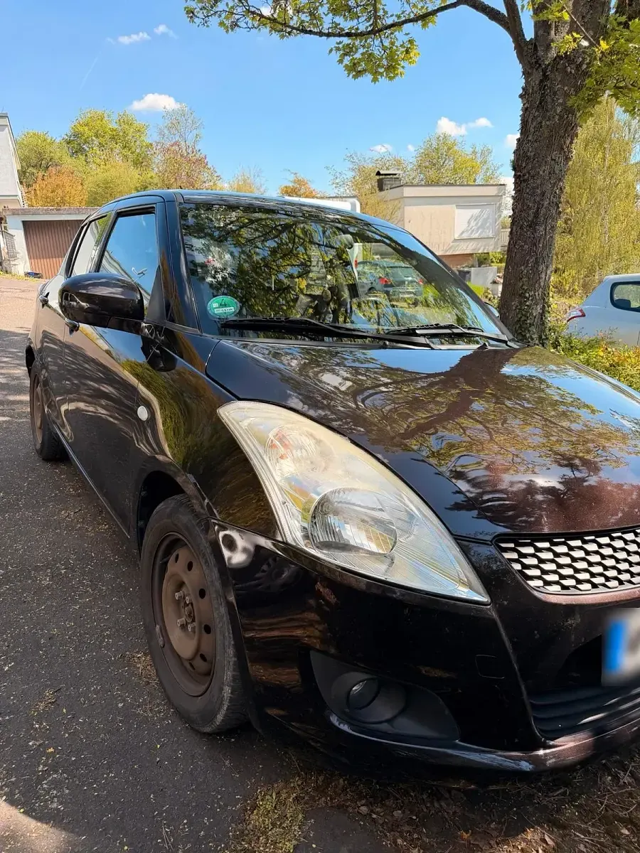 Gebraucht Suzuki Swift 94 PS (69 kW) 2013 Braun Kleinwagen