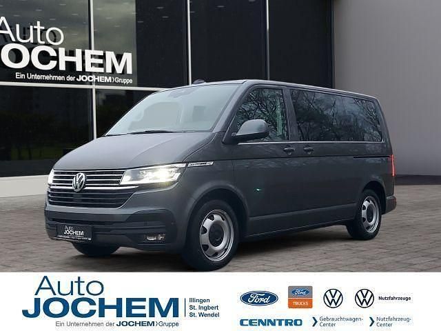 Grau Gebraucht 2024 VW Multivan Comfortline Van | 63.444 € (Teuer) - Bild 1/4