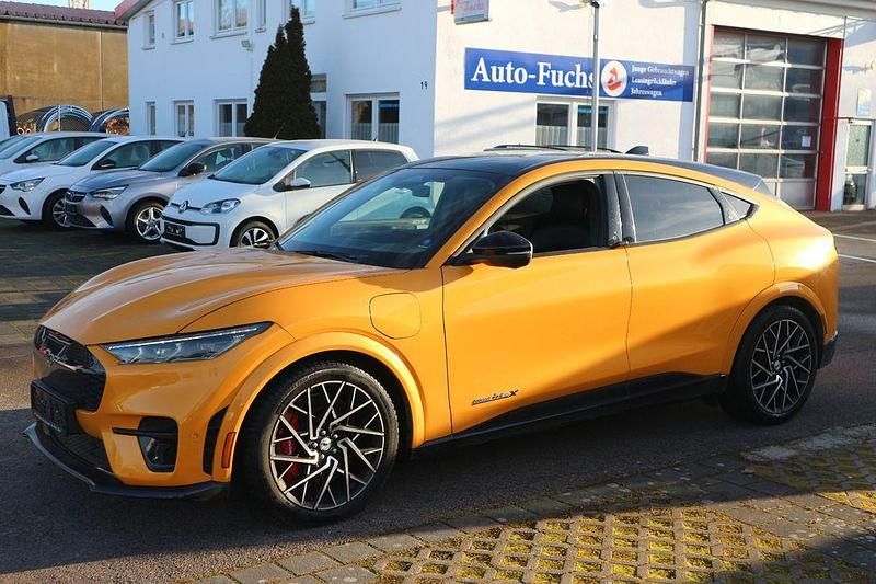 Orange Gebraucht 2021 Ford Mustang Mach-E GT SUV | 36.500 € - Bild 1/4