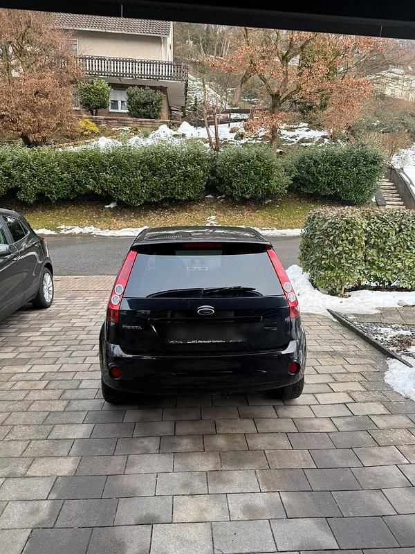 Gebraucht Ford Fiesta Ambiente 70 PS (51 kW) 2007 Schwarz Kleinwagen