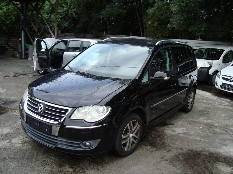Schwarz Gebraucht 2007 VW Touran Highline Van / Kleinbus | 2.650 € (Fairer Preis) - Bild 1/4