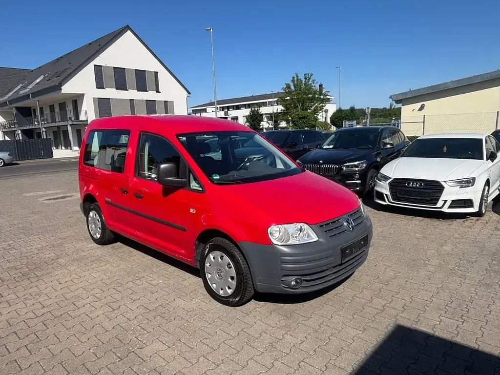 Gebraucht VW Caddy Team 105 PS (77 kW) 2010 Rot Van / Kleinbus