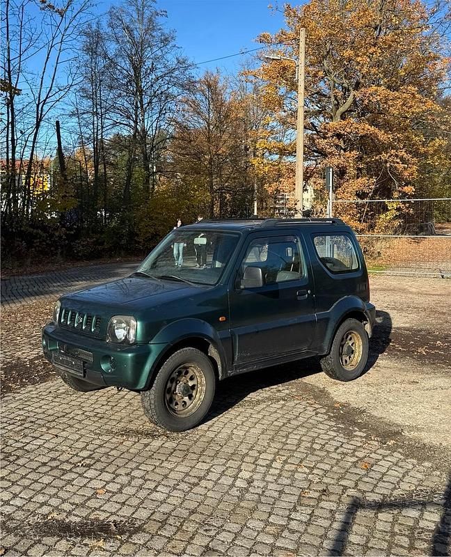 Grün Gebraucht 2002 Suzuki Jimny SUV | 2.299 € (Superpreis) - Bild 1/4