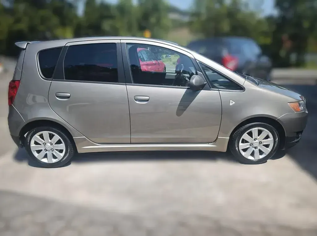 Gebraucht Mitsubishi Colt Motion 95 PS (69 kW) 2012 Beige Kleinwagen