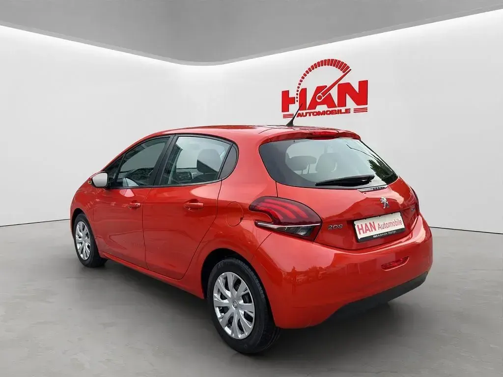 Gebraucht Peugeot 208 Active 82 PS (60 kW) 2016 Orange Kleinwagen