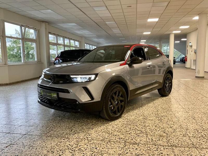 Gebraucht Opel Mokka GS Line 101 PS (74 kW) 2023 Kontrast grau/quarz silber (metallic) SUV