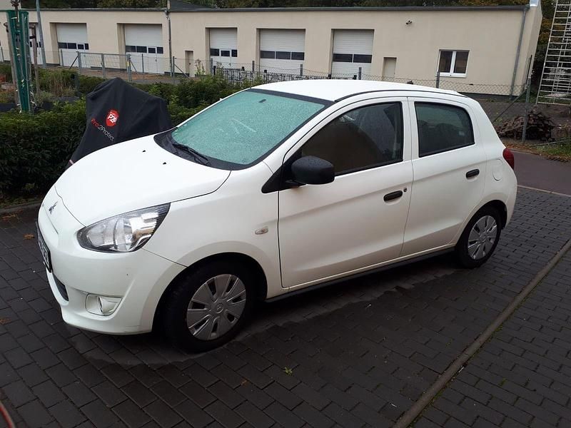 Weiß Gebraucht 2015 Mitsubishi Space Star Kleinwagen | 5.500 € (Fairer Preis) - Bild 1/4