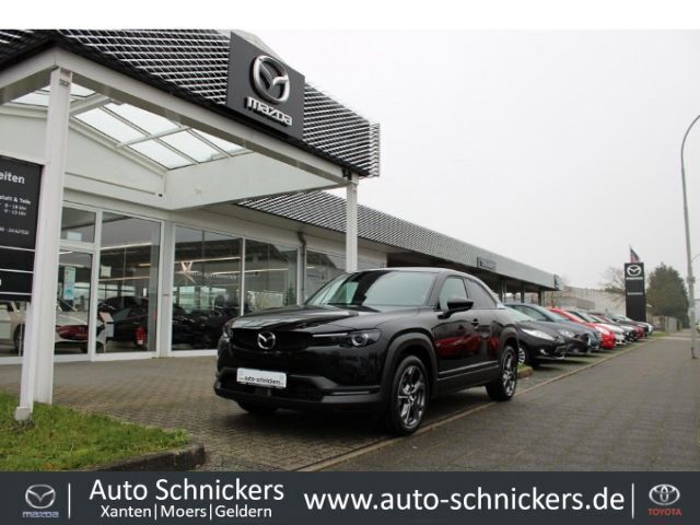 Onyxschwarz (metallic) Gebraucht 2020 Mazda MX30 Sky SUV | 15.740 € (Etwas zu teuer) - Bild 1/4