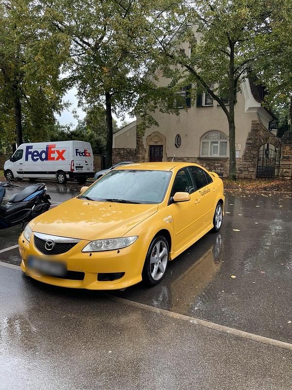 Gelb Gebraucht 2002 Mazda 6 Inclusive Kleinwagen | 1.650 € (Fairer Preis) - Bild 1/4