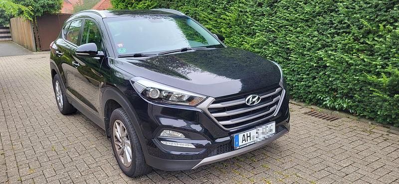 Schwarz Gebraucht 2015 Hyundai Tucson Classic SUV | 13.300 € (Fairer Preis) - Bild 1/4