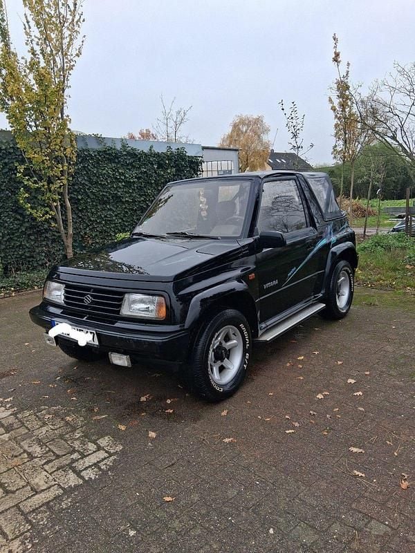 Gebraucht Suzuki Vitara 86 PS (63 kW) 1994 Schwarz Cabrio