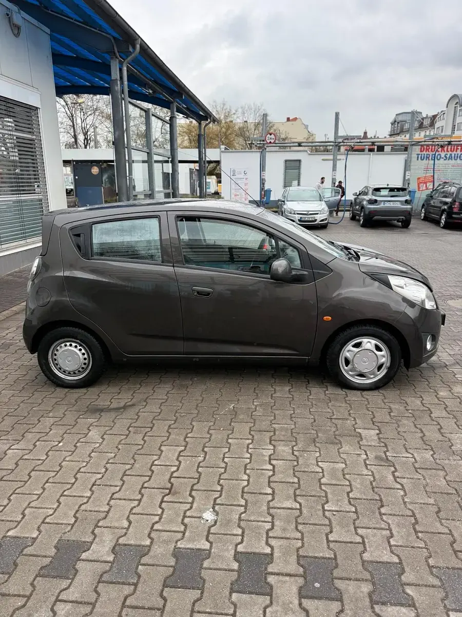 Gebraucht Chevrolet Spark 68 PS (50 kW) 2011 Braun Kleinwagen