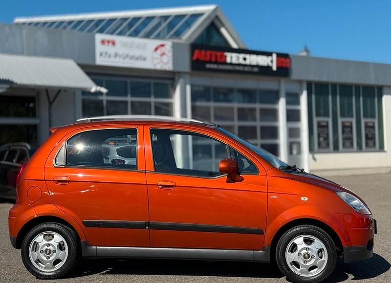Orange Gebraucht 2009 Chevrolet Matiz SE Kleinwagen | 5.500 € - Bild 1/4