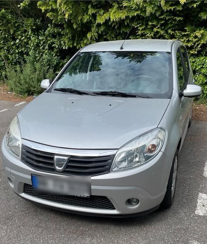 Grau Gebraucht 2012 Dacia Sandero Kleinwagen | 2.100 € - Bild 1/4
