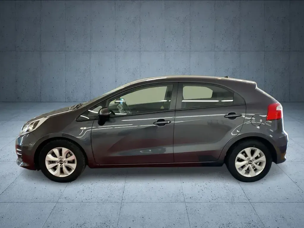Gebraucht Kia Rio 90 PS (66 kW) 2015 Grau Limousine