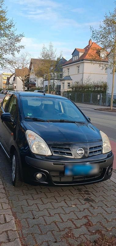 Gebraucht Nissan Pixo 68 PS (50 kW) 2012 Schwarz Kleinwagen