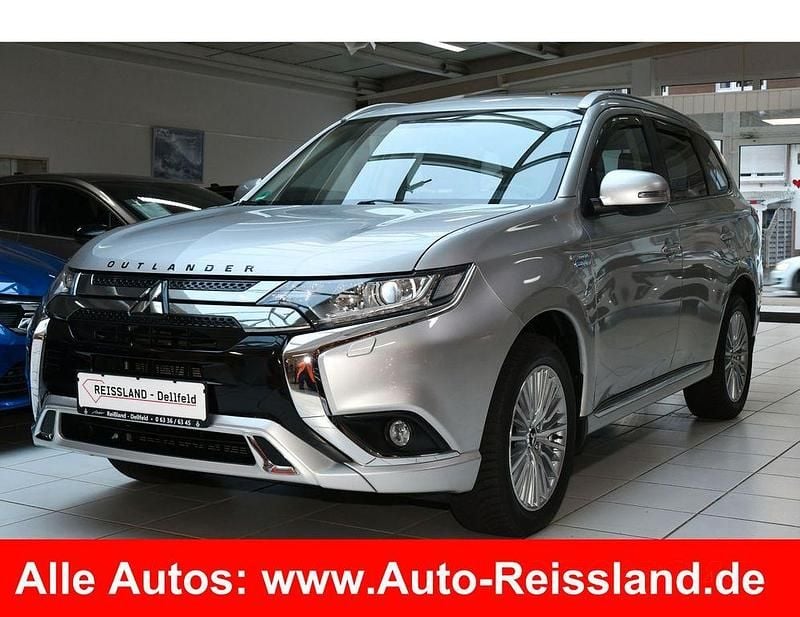 Silber Gebraucht 2019 Mitsubishi Outlander P-HEV Basis SUV | 18.390 € (Fairer Preis) - Bild 1/4