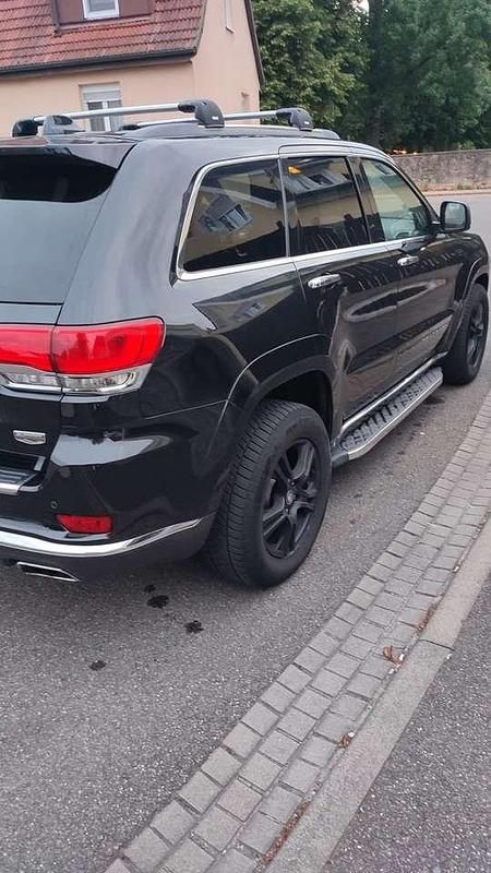 Schwarz Gebraucht 2016 Jeep Grand Cherokee Summit SUV | 18.999 € (Fairer Preis) - Bild 1/4